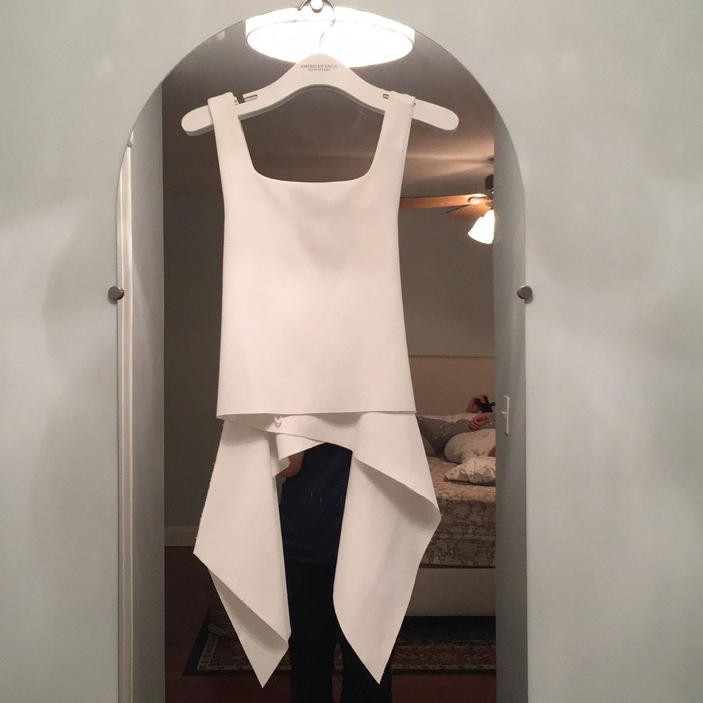 White crop top with bow details in the back
